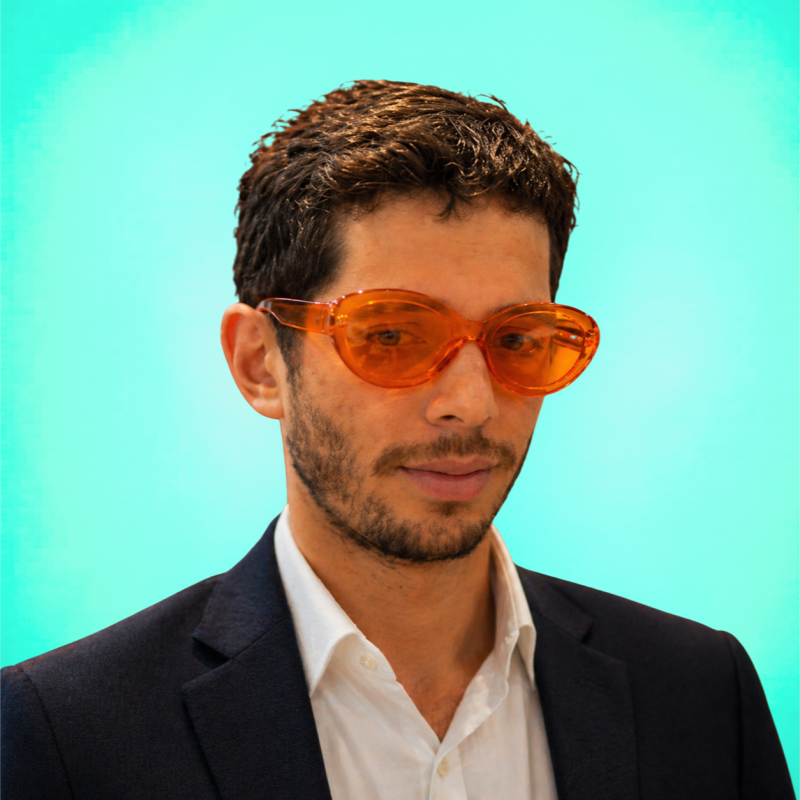Joseph Castillo wearing orange glasses
